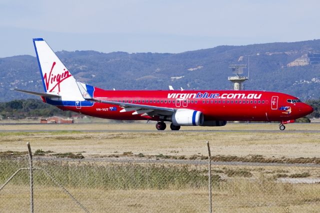 Boeing 737-800 (VH-VUT) - On taxi-way, heading for take off on runway 05. Friday, 19th April 2013.