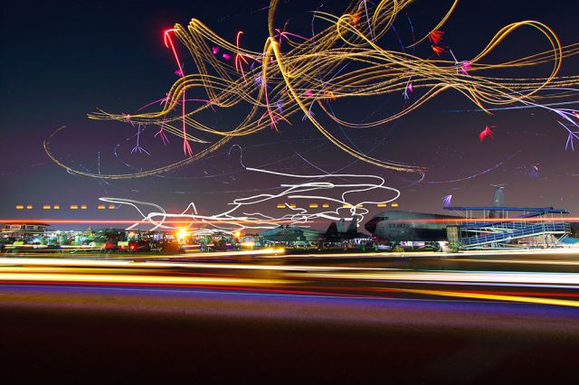 — — - This is a photo of the nighttime airshow at the 2021 Sun N Fun expo at the Lakeland Florida airport. The photo is a compilation of several photos of multiple performers. The performing aircraft gave wingtip fireworks shows in addition to LED light effect shows. You'll also notice all the light trails on the ground in front of the camera, those light trails are from all the passing golf carts and utility vehicles. I shot this with a 10mm Canon lens with an aperture of F/8 and exposures of 32 seconds each. Please check out my other photography. Positive votes and comments are always appreciated...!!! Questions about this photo can be sent to Info@FlewShots.com