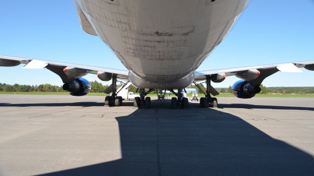 Boeing Dreamlifter (N718BA) - Taken directly under the tail of the Boeing DreamLifter on the Tarmac of Griffiss International Airport during 3 week visit for servicing at Premier Aviation Services in September 2013