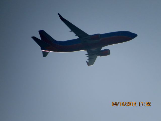 BOEING 737-300 (N365SW) - Southwest flight 40 from Dallas Love to Tulsa over OneOK field in Tulsa.