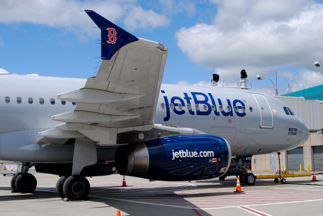 Airbus A320 (N605JB) - JetBlues Red Sox logojet in Worcester for a Wings for Autism event and a plane pull to benefit autistic children