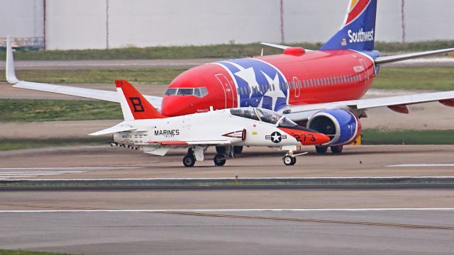 Boeing Goshawk (16-5078) - McDonnell Douglas T-45 Goshawk departing Nashville, Tennessee on runway 20C as Southwest Airlines "Tennessee One" (tail number N922WN) awaits departure.