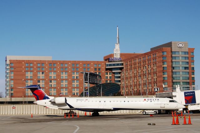 Canadair Regional Jet CRJ-900 (N932XJ) - Ice cold out on 01/03/13 in front of the Logan Airport Hilton