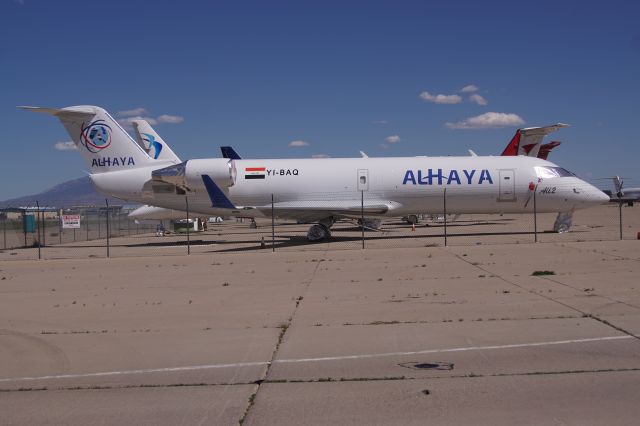 Canadair Regional Jet CRJ-200 (YI-BAQ) - A newly converted Canadair CRJ200F, in storage at Tucson.  Photographed April 2nd 2020.