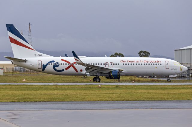 Boeing 737-800 (VH-RQG) - Rex Airlines (VH-RQG) Boeing 737-8FE(WL), ex Virgin Blue and Virgin Australia VH-VUF, at Wagga Wagga Airport. Just out of paint hangar before a storm moved through. br /br /The engines were removed for maintenance after it arrived and is currently awaiting for the engines to arrive. 