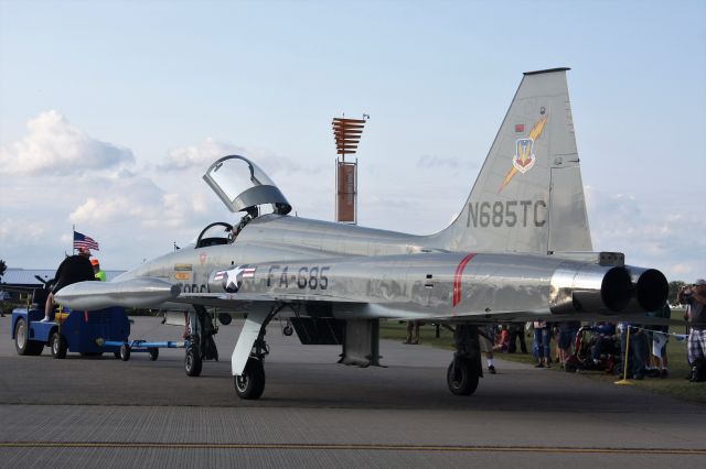 Northrop RF-5 Tigereye (N685TC) - The F-5 being towed to Warbirds area after show performance.