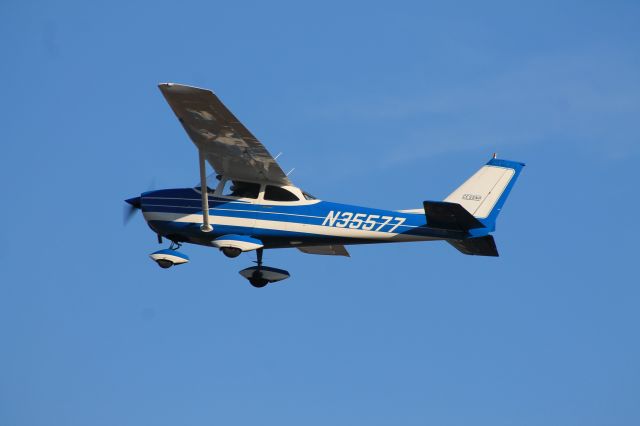 Cessna Skyhawk (N35577) - N35577 climbing after a runway 2 departure.