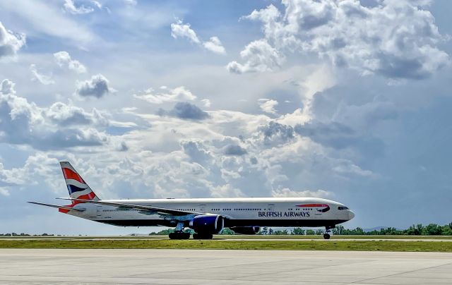 BOEING 777-300 (G-STBA) - Just after landing operating a cargo flight from LHR.  Beautiful evening sky with some dark clouds rolling in.  7/14/21.