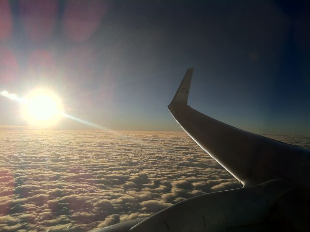 Boeing 737-700 — - From AMS to BUD. Cloud formations