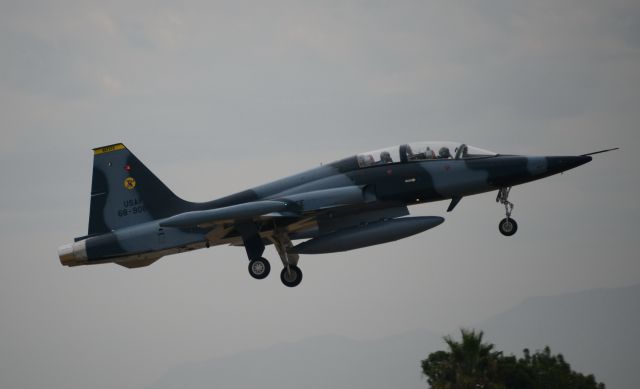 Northrop RF-5 Tigereye (N675TC) - Over the fence at Van Nuys. Northrop F-5B