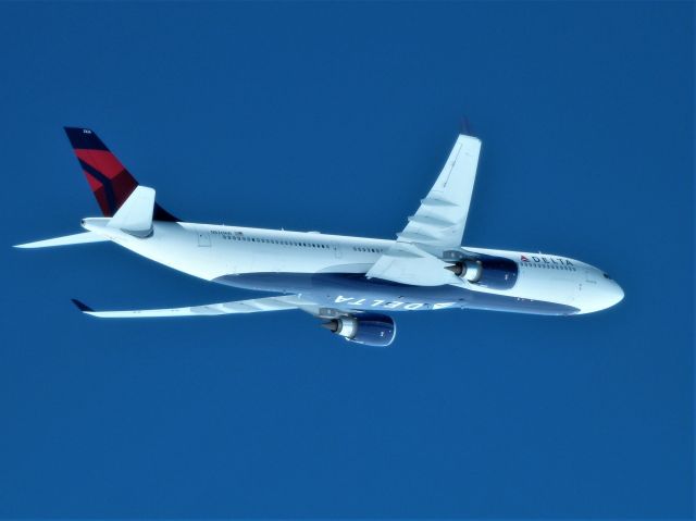 Airbus A330-300 (N826NW) - This photo was taken over the North Atlantic shorty after the aircraft was commissioned for service.