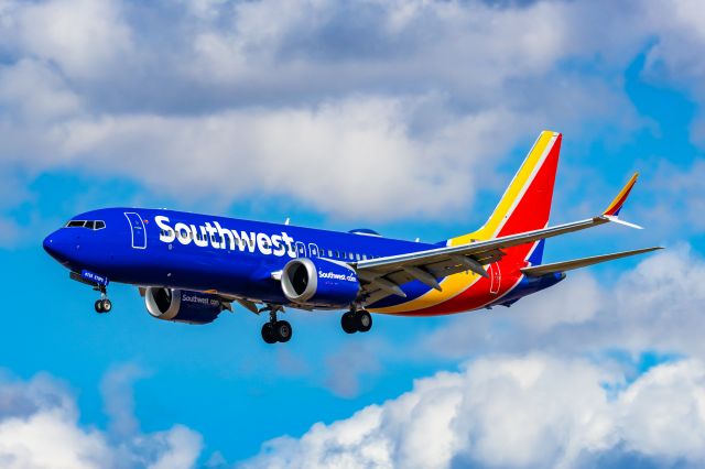 Boeing 737 MAX 8 (N8735L) - A Southwest Airlines 737 MAX 8 landing at PHX on 2/28/23. Taken with a Canon R7 and Canon EF 100-400 L ii.
