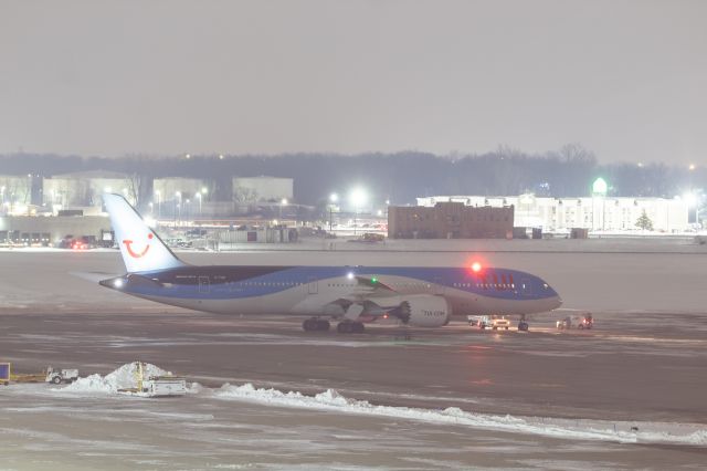 Boeing 787-9 Dreamliner (G-TUIO) - Tui UK sitting on the former De-Ice pad next to Signature with its beacon on before taking off to London-Gatwick.