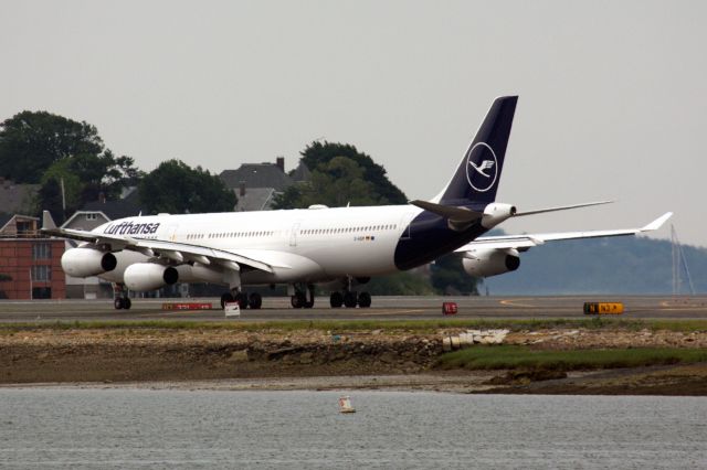 Airbus A340-300 (D-AIGM) - Lufthansa A343 in new colors a diversion from JFK due to weather (thunderstorms)