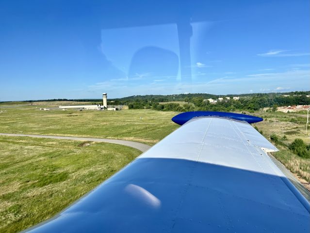 Piper PA-24 Comanche (N6551P) - Touch and goes on runway 02. 