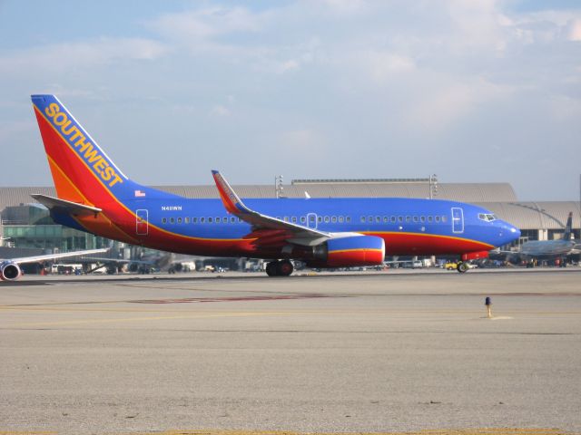 Boeing 737-700 (N411WN) - Holding on RWY 19R