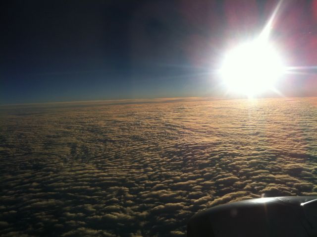 Boeing 737-700 — - From AMS to BUD. Cloud formations with sun