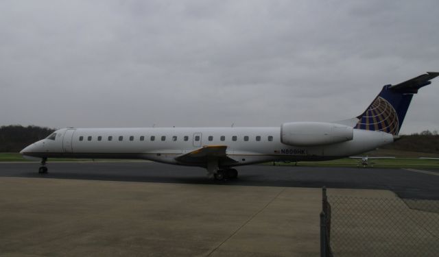 Embraer ERJ-145 (N809HK) - at a general aviation airport - a charter, perhaps?