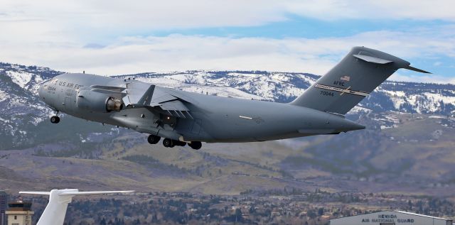 Boeing Globemaster III (97-0044) - 97-0044, a USAF C-17A Globemaster named "Spirit Of The City Of Fairborn," climbs skyward after lifting off from Runway 16L.  97-0044 is based at Wright - Patterson AFB in Fairborn, Ohio.