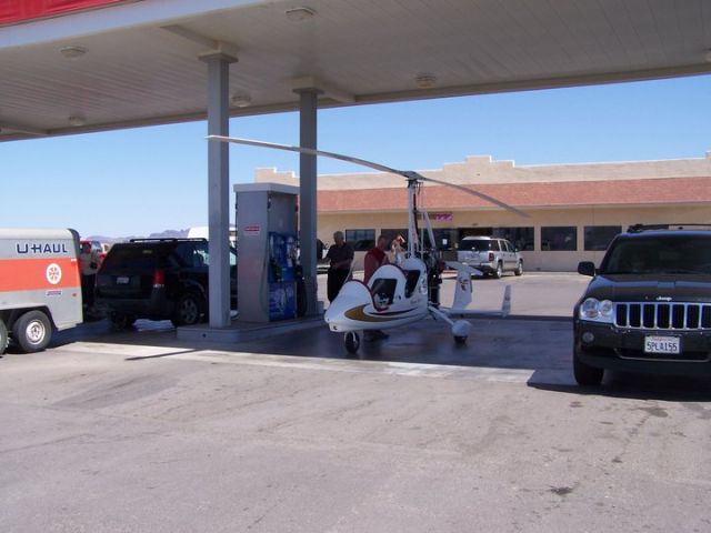 N316MG — - Paul Salmon and Mark Sprigg refueling at a gas station in Blythe, California