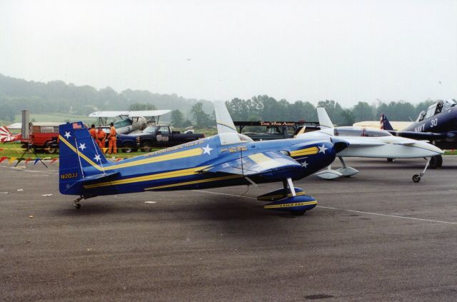 STEPHENS Akro (N20JJ) - SUSSEX AIRPORT-SUSSEX, NEW JERSEY, USA-AUGUST 1994: Pictured at the 1994 Sussex Airshow on static display was pilot Jim Roberts' Akro Laser 200. Jim was a member of the United States Aerobatic team in 1981 and 1982 and would return each year, schedule permitting, to perform at the Sussex Airshow with his friend and former U.S. National and World Aerobatic Champion Leo Loudenslager.