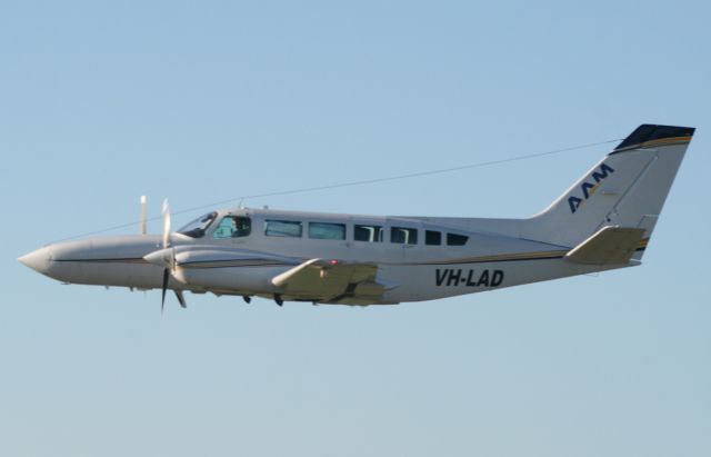 Cessna 404 Titan (VH-LAD) - VH-LAD taking off to the east from Emerald Airport to conduct some aerial mapping on the 12th March 2017