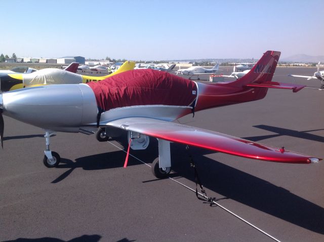 Lancair Legacy 2000 (N11LL) - 2014 Oshkosh champion Kit built Lancair Legacy, attending LOBO flyi-in at Rdmond, OR....this plane is just about as flawless as an airplane gets!  If you see her on a ramp, climb under and see how pretty all the plumbing and finish is within the wheelwells!  