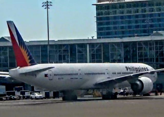 BOEING 777-300ER (RP-C7774) - Waiting to board passengers to Manila.