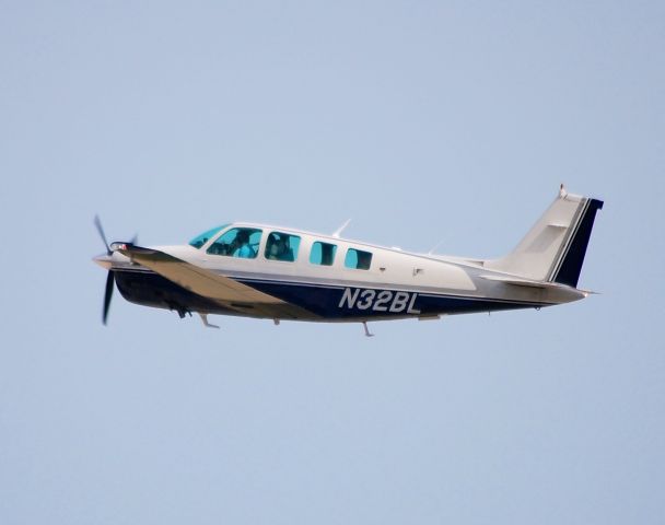 Beechcraft Bonanza (N32BL) - Departing EAA Airventure/Oshkosh on 25 July 2012.