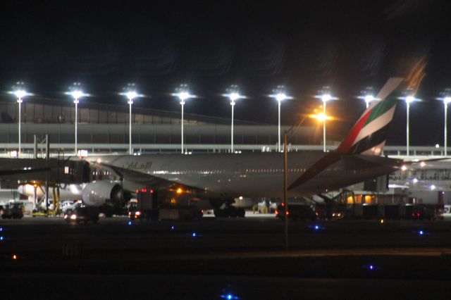 BOEING 777-300ER (A6-EPV) - One of the newer Emirates 77Ws rests at the International terminal before heading back to home base, Dubai!