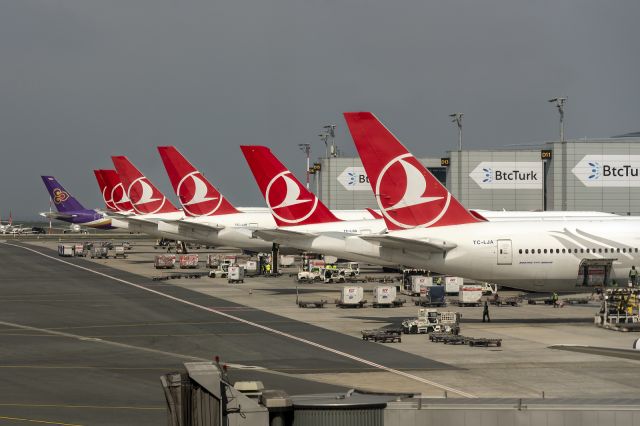 BOEING 777-300ER (TC-LJA) - 21st March, 2024: Line up of heavies at Istanbul Havalimanı - one of the most modern airports in the world. 