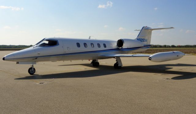 Learjet 35 (N925DM) - Walking along aircraft parking area taking pictures. No problems with TSA or cops.