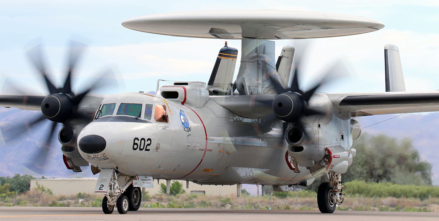 Grumman E-2 Hawkeye (16-9069) - United States Navy Grumman E-2D Hawkeye (169069)br /VAW 117 (Airborne Command and Control Squadron One One Seven) "Wallbangers"br /Current Home Port: NAS Pt Mugu, CAbr /Assigned to the USS Abraham Lincoln (CVN 72) .... Carrier Air Wing Nine (CVW 9)... Pacific Fleetbr /br /The first of a pair of Wallbangers Hawkeyes taxies toward us on Alpha as it heads out to participate in a training exercise.