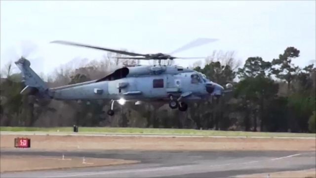 — — - USN SH-60R of Squadron HSM-46 hovering and ready to climb from North Myrtle Beach Grand Strand Airport (KCRE) on 3/6/2015.