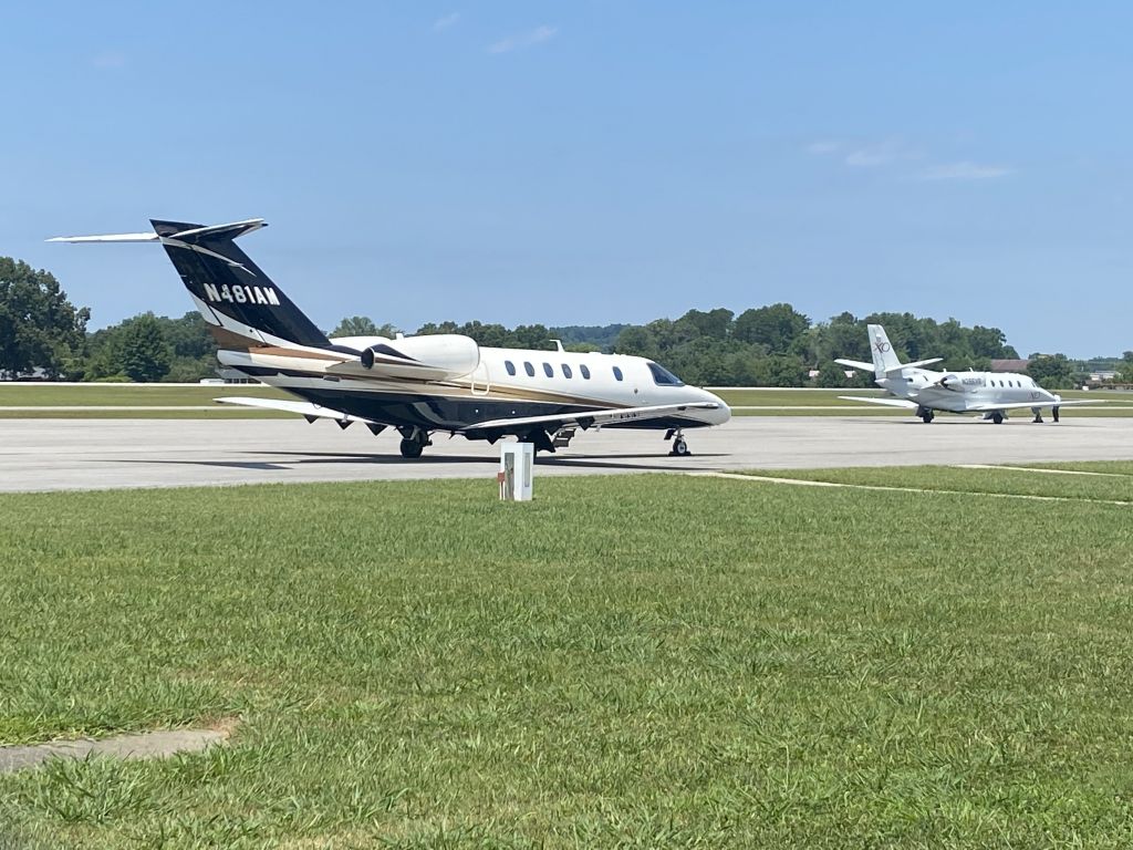 Cessna Citation CJ4 (N481AM) - Resting on the ramp as a Cessna Citation Excel (N286VR) is starting up its engines!br /br /Date Taken: July 18, 2024