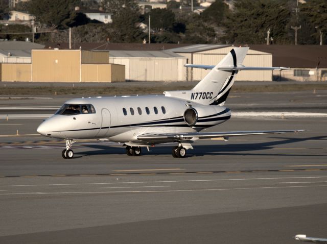 Hawker 800 (N770CC) - KMRY - N770CC rolling off the main to the Monterey Jet center Feb 2015 ATT Pro Am Golf week.