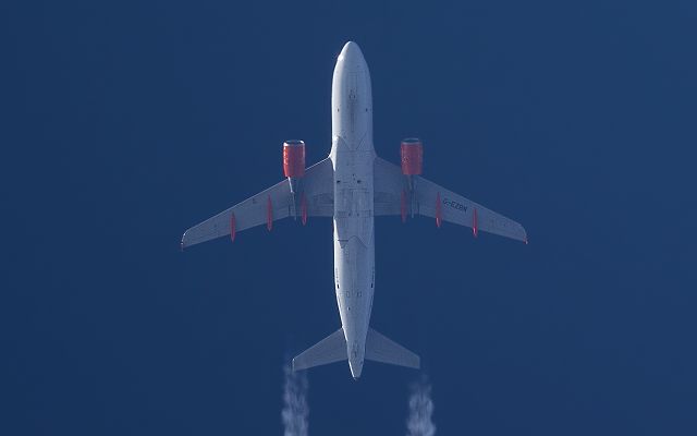 Airbus A319 (G-EZBN) - Easyjet Airbus A319 G-EZBN  passes overhead West Lancashire ,England,UK at 37,000ft working route Edinburgh-London Gatwick 7-4-2014.br /br /Pentax K-5.