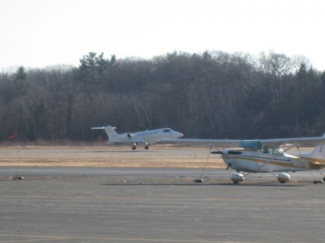 Learjet 45 (N942FK) - Bullock Charter arriving on runway 32 from Lincolnton, NC (KIPJ) with N69TS sitting in front.