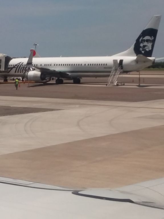 Boeing 737-900 (N431AS) - Alaska 737 parked at Puerto Vallarta Airport awaiting departure to Los Angeles.