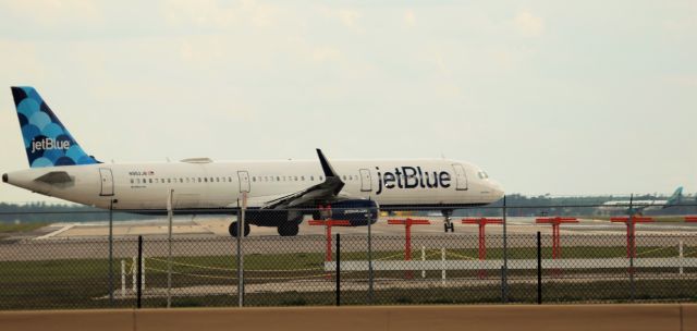 Airbus A321 (N952JB) - 4/22/23 lining up with Rwy 18R for departure