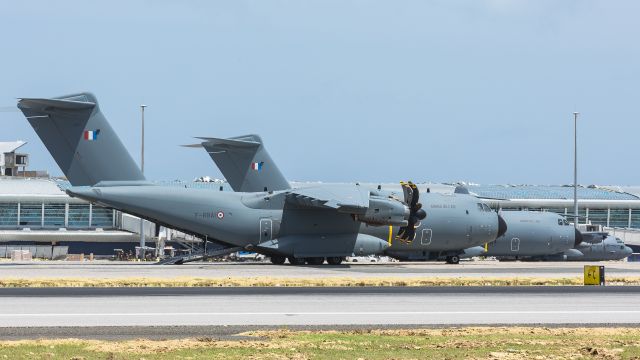 AIRBUS A-400M Atlas (F-RBAI) - Side by side they go the mighty french A400's park side by side with a sibling Dutch work horse the C130.