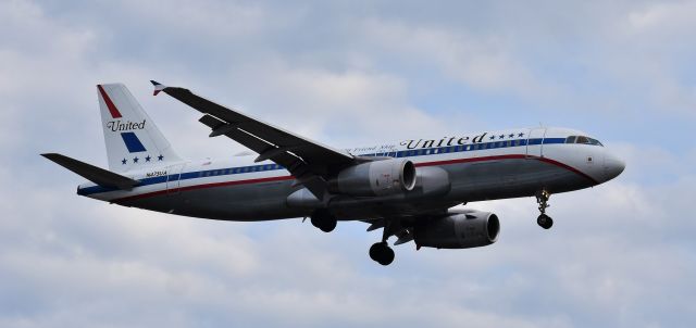 Airbus A320 (N475UA) - On short final at RDU, just an hour ago! Apologize for the weather.  Couldn't miss seeing the ol' Friendship, though! At the end of 23R, 2/4/20.