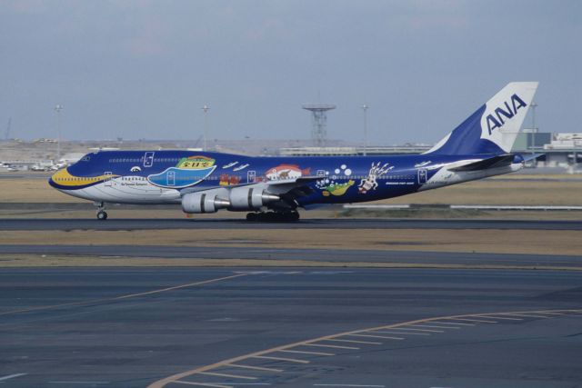 Boeing 747-400 (domestic, no winglets) (JA8963) - Landing at Tokyo-Haneda Intl Airport Rwy34L on 1995/03/12 "ANA Marine Jumbo c/s "