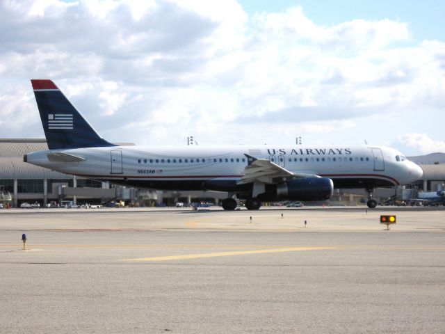 Airbus A320 (N663AW) - Holding on RWY 19R