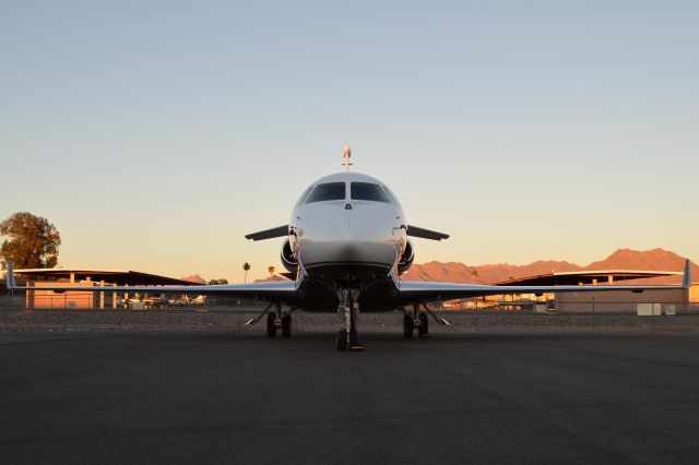 Dassault Falcon 7X (N150BC) - Head on with a beautiful 7X at sunset.