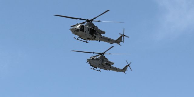 Bell UH-1V Iroquois (16-9105) - Foreground (Top) ...br /United States Marines Bell UH-1Y Venom // Super Huey (169105)br /Background ...br /United States Marines Bell AH-1Z Viper // Super Cobra (169097)br /Both ....br /HMLA 267 (Marine Light Attack Helicopter Squadron Two Six Seven) "Stingers"br /MCAS (Marine Corps Air Station) Miramar, CA