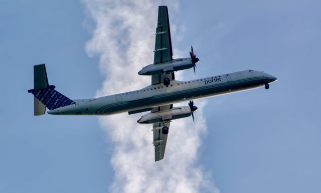 de Havilland Dash 8-400 (C-GLQR) - Porter dash 8 passing under a high contrail inbound to BOS