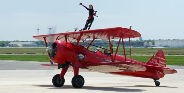 N65263 — - McGUIRE AIR FORCE BASE, WRIGHTSTOWN, NEW JERSEY, USA-MAY 11, 2014: The Third Strike Wing Walking team lands and waves to the crowd after performing at the 2014 Open House and Air Show.