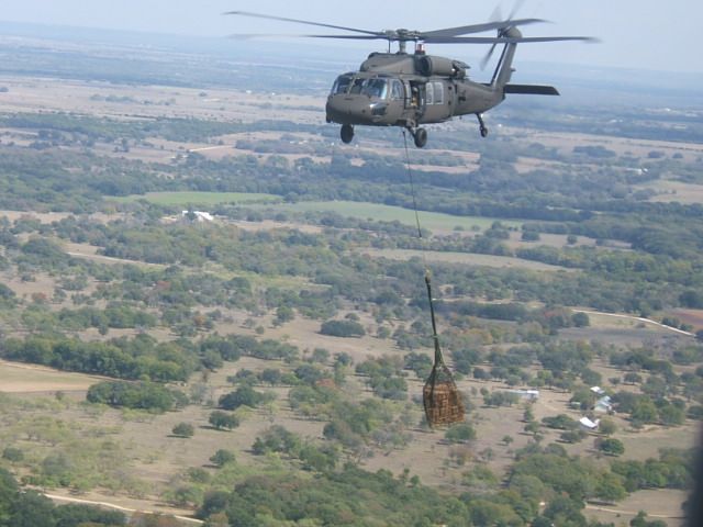 — — - My unit was selected to test the UH-60M before the official roll out to the entire Army. This was me crewing on a hawk slinging MREs for troops in the field.