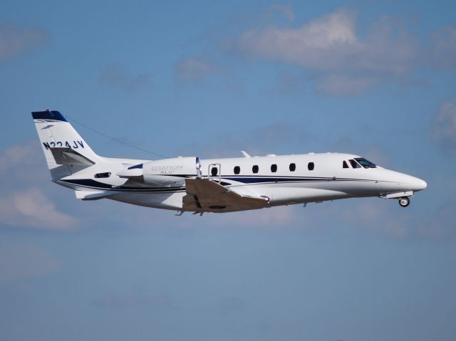 Cessna Citation Excel/XLS (N224JV) - VANNOY CONSTRUCTION AIRCRAFT LLC departing runway 20 at KJQF - 2/5/13